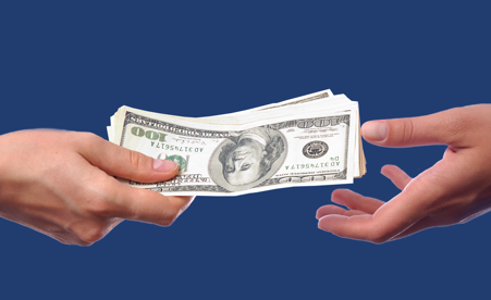 Image containing hundred dollar bills being passed from one hand to another