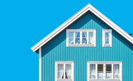 Blue house against a blue background