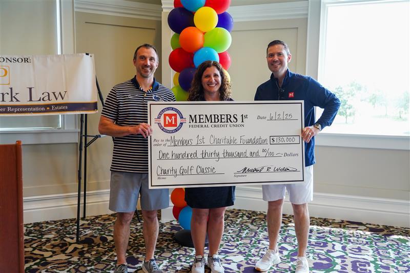 Members 1st Presenting Check